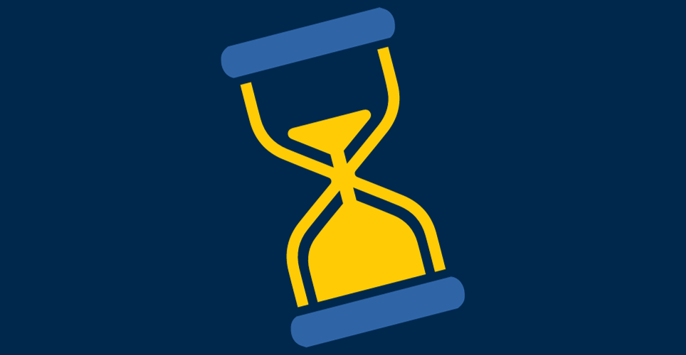 A yellow hourglass with sand pouring from top to bottom on a navy blue background