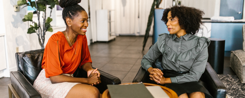 Two employees havng a conversation