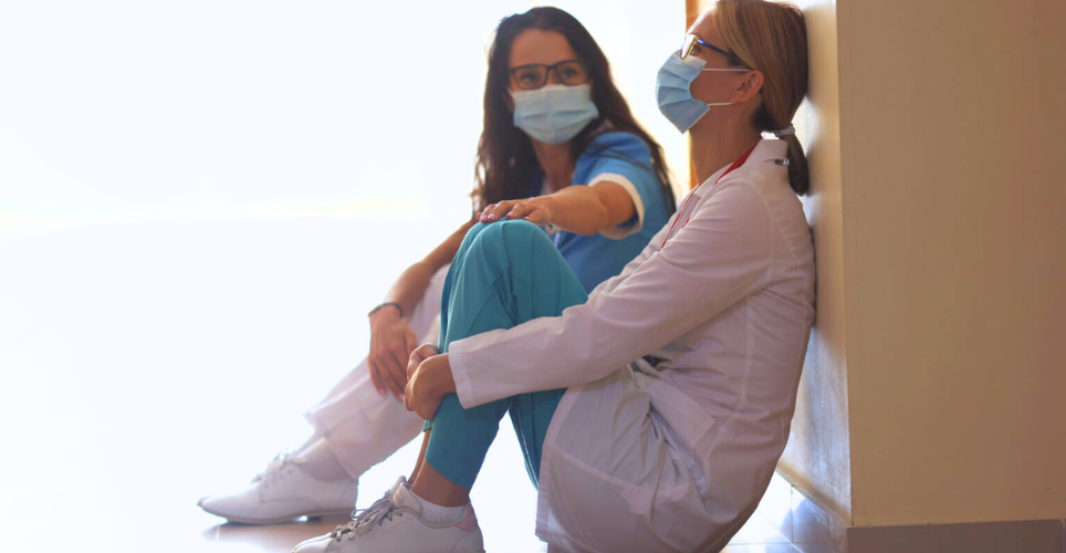 One employee helping another employee grieve