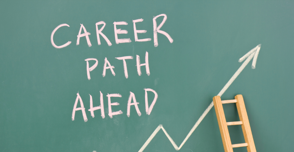 Career path ahead written on a chalk board with an arrow pointing forward and upward