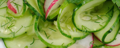 slice cucumbers and radishes