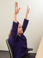 photo of woman with arm raised up
