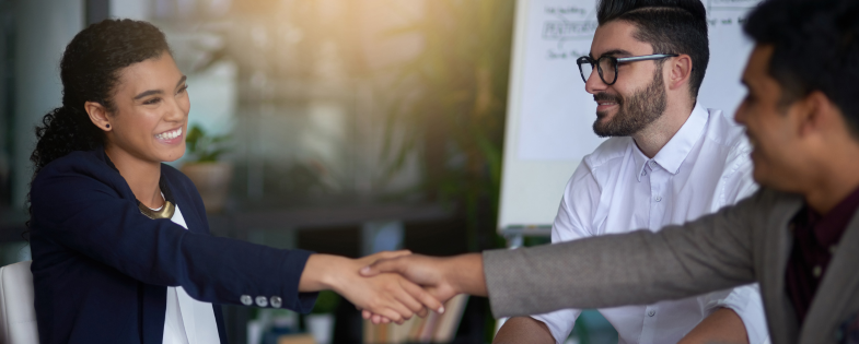 Coworkers shaking hands