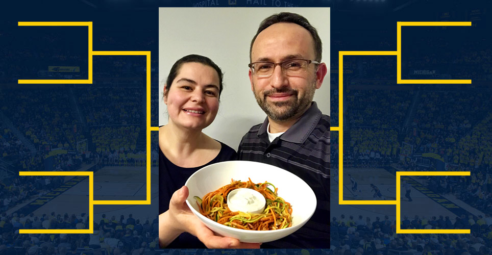 Husnu and Ruhsar display a bowl of their winning recipe for Zuke and Carrot Spaghetti 