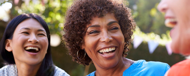 three women smiling