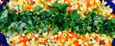 corn saute with parsley on top