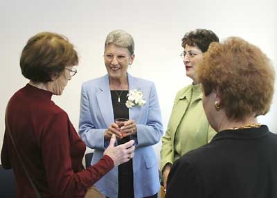 Nancy Bates talking with a group of women