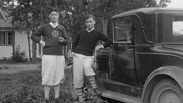 Nicholas and Leonard Falcone standing next to car