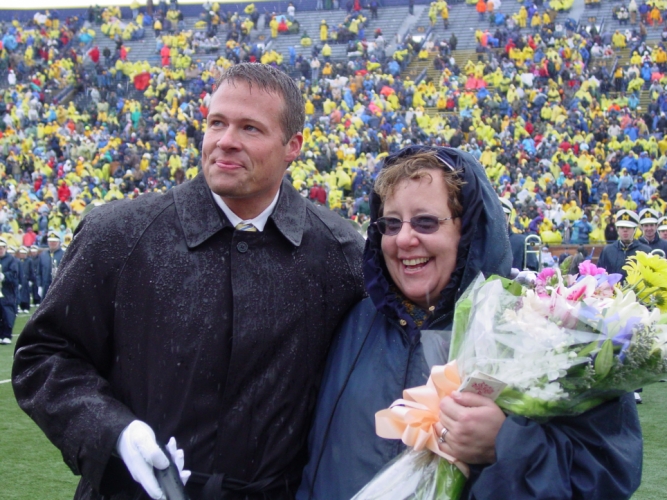 Maggie St. Clair with Michigan Marching Band director Jamie Nix