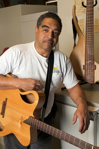 John Sargent with one of his guitars