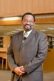 Tendaji Ganges standing with arms crossed