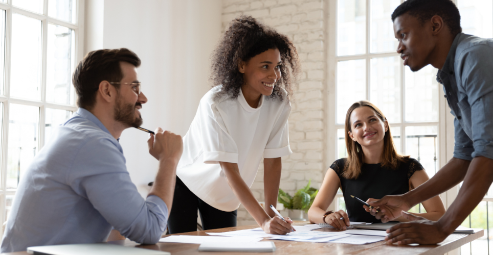 Group of coworkers communicating effectively with each other