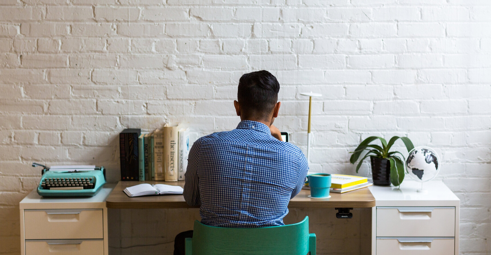 Man working in a home office setting