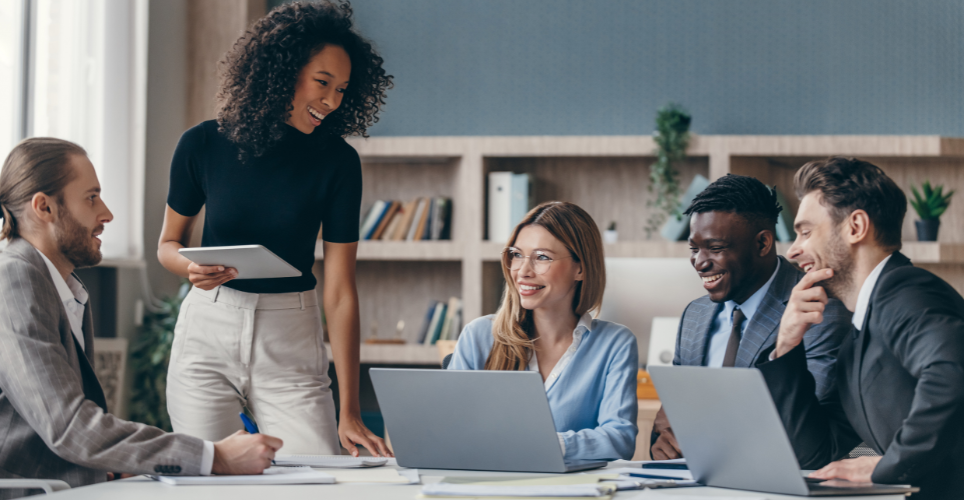 Group of coworkers engaging in conversation